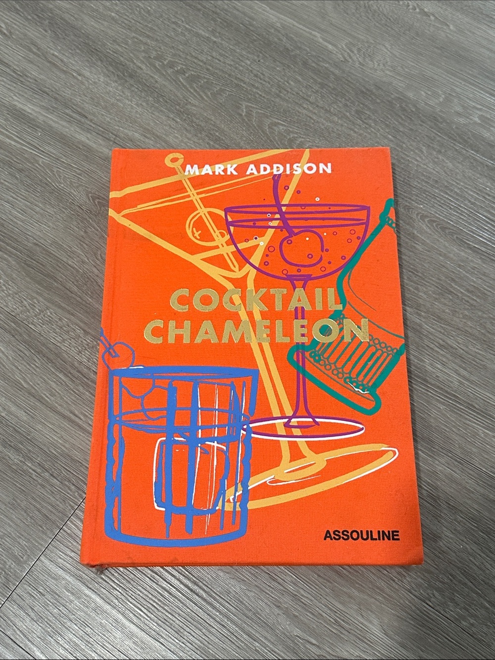 Assouline Orange Cocktail Chameleon by Mark Addison